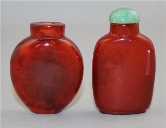 Two Chinese amber snuff bottles, 1800-1900, Richards no.s 55 and 141